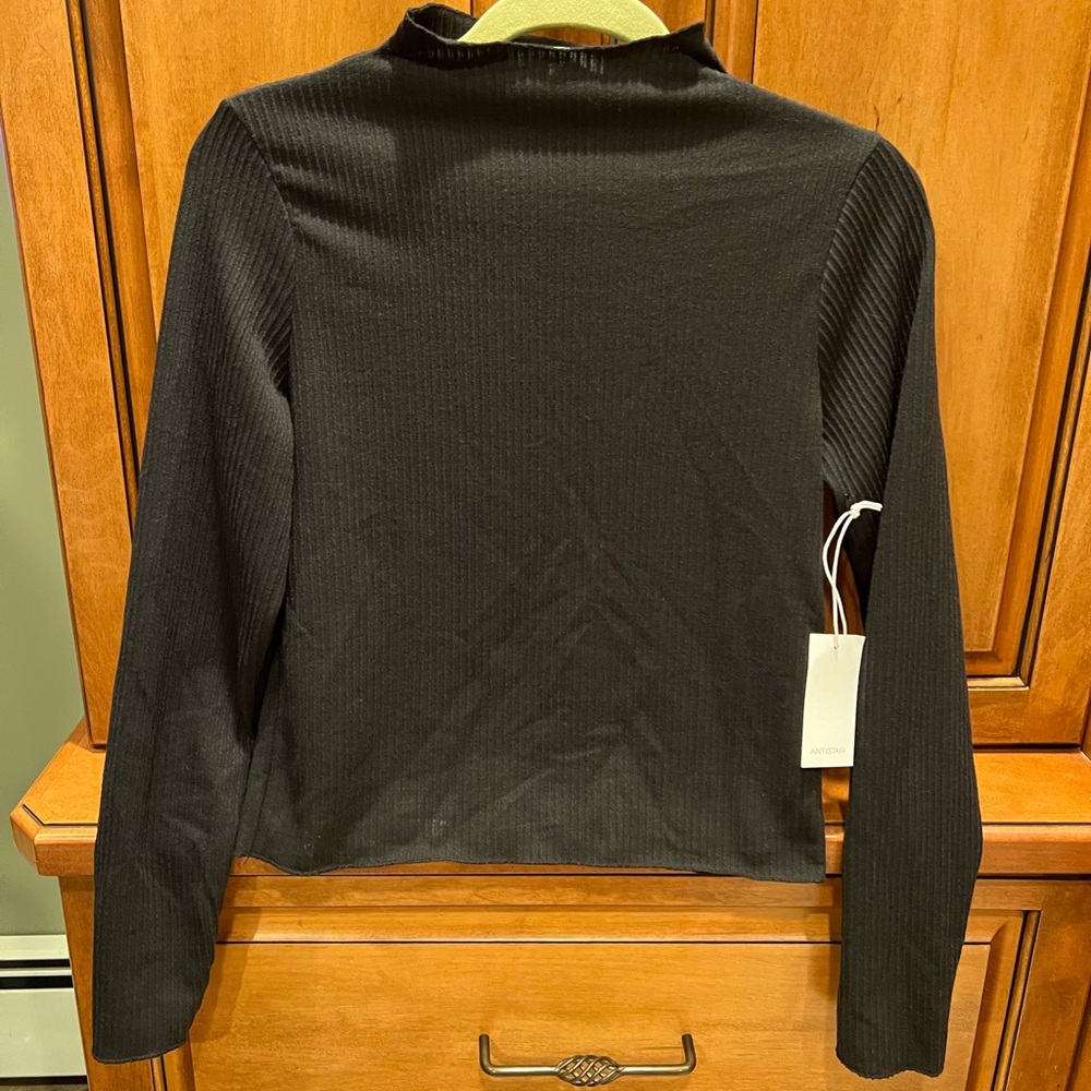 NWT Antistar top